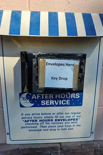 After hours service key drop box with instructions.