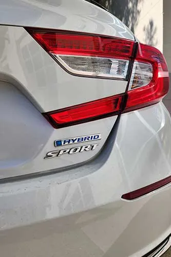 Close-up of hybrid sport car rear badge