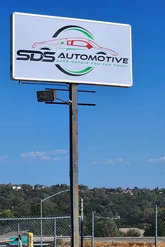 SDS Automotive repair shop sign outdoors.